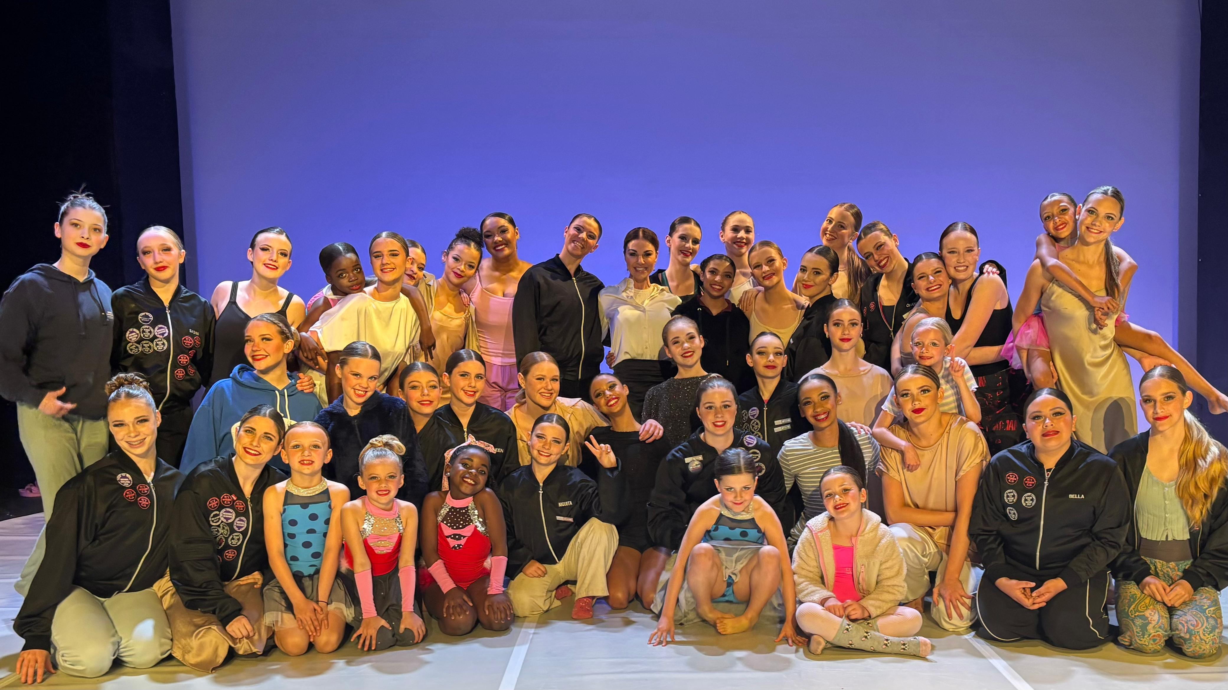 Outline Dance Centre full group photo on stage