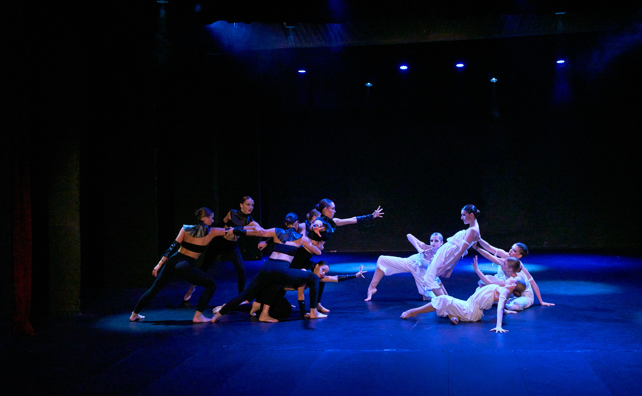 Outline Dance Centre - group black white drama stage