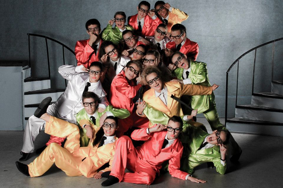 Outline Dance Centre - group colorful suits glasses