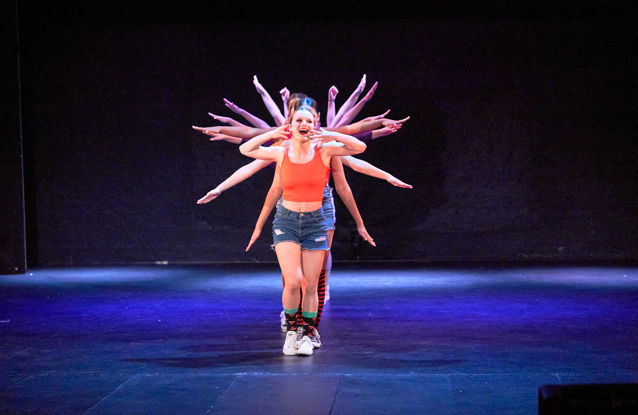 Outline Dance Centre - group sunburst arms orange